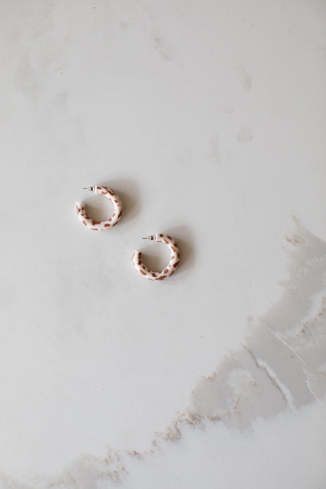 Dr Christine Earrings Brown Cow Print